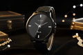 Titan Men’s Black Analog Quartz Watch | Premium Stylish Wrist Watch for Men displayed on a black surface with elegant accessories.